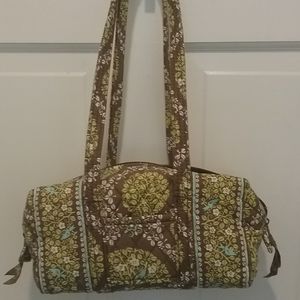 Quilted satchel with shoulder length straps.